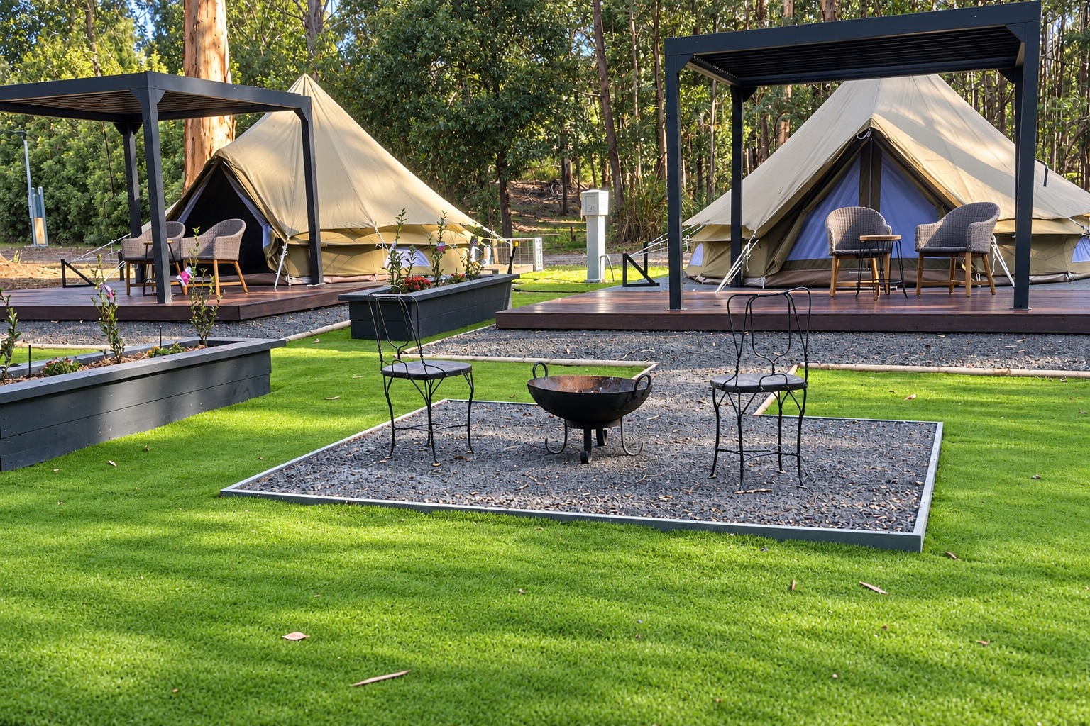 Two furnished bell tents with pergolas and a shared outdoor fire-pit area.